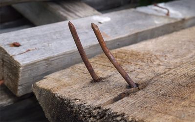 rusty nails on wood swing set